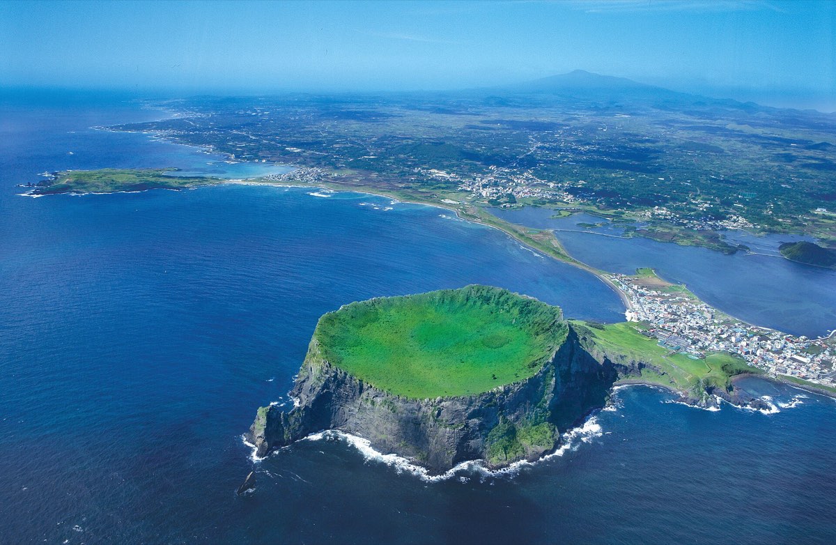 Seongsan Ilchulbong sunrise peak on Jeju Island, a key backdrop of When Life Gives You Tangerines